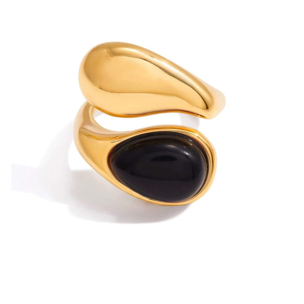 AURA STONE Ring in Gold mit schwarzem Stein-Cabochon und offenem asymmetrischem Design