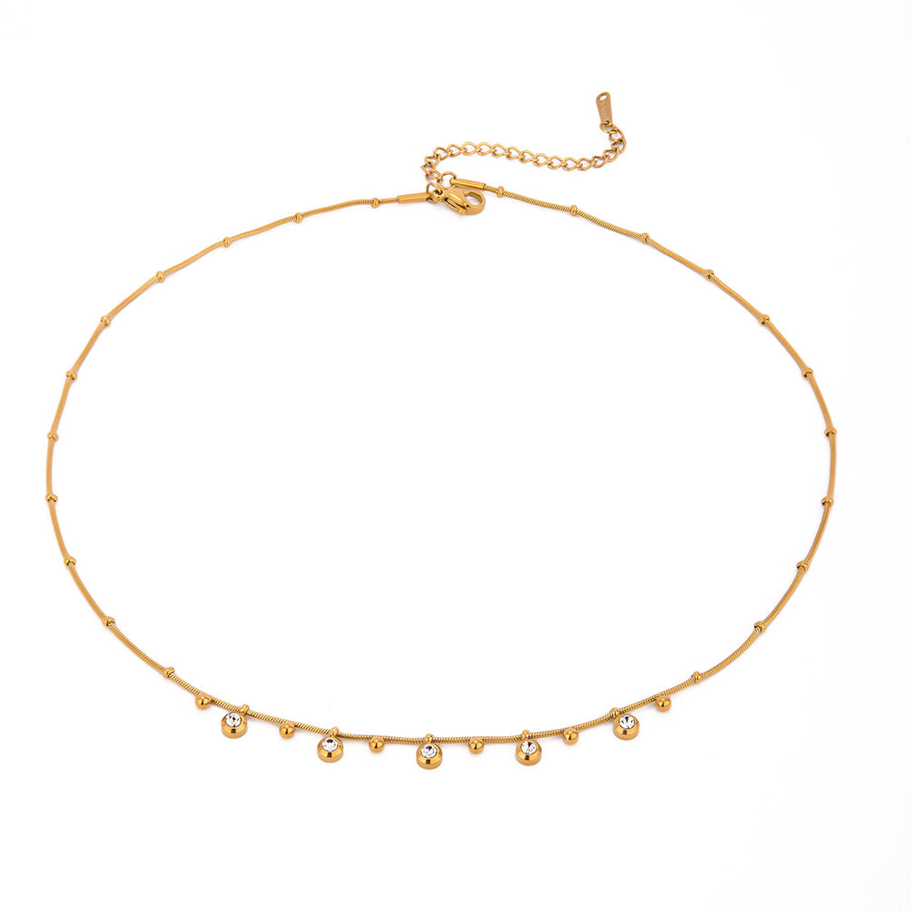 AURÉLE Charm Kette in Gold mit funkelnden Kristall-Charms