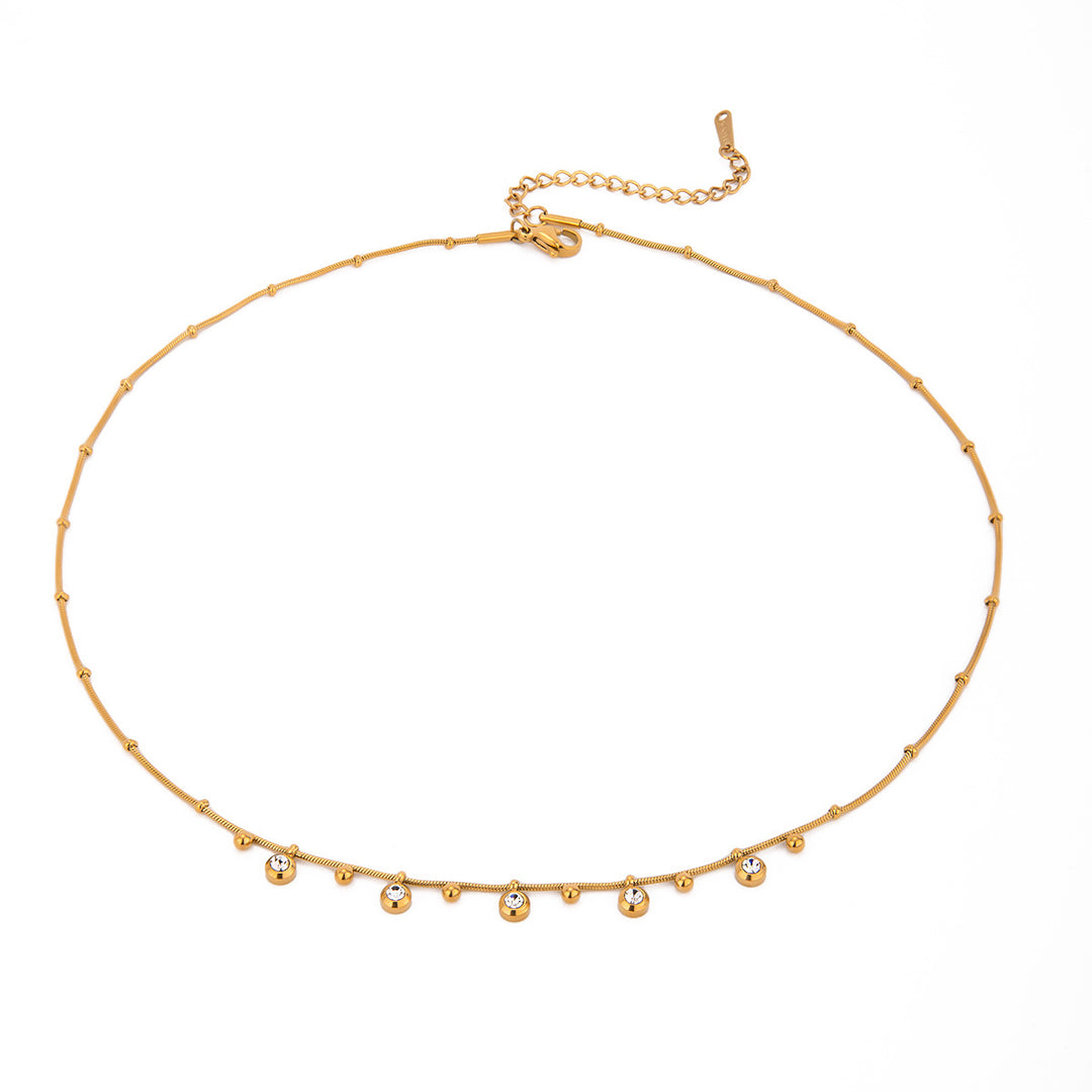 AURÉLE Charm Kette in Gold mit funkelnden Kristall-Charms