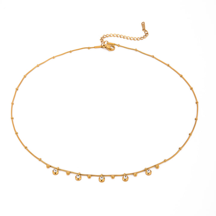 AURÉLE Charm Kette in Gold mit funkelnden Kristall-Charms