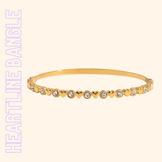 Goldener Armreif mit kleinen Kristallherzen – TREND Kollektiv