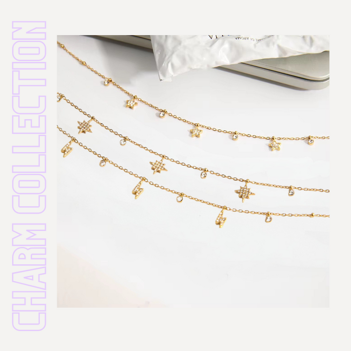 alle drei Charm ketten - star - bold star - sparkle flash - untereinander gelegt - Charm Collektion von TREND Kollektiv